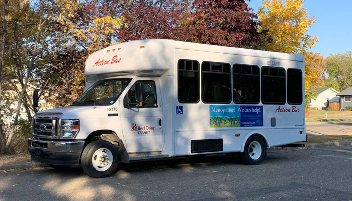 A Red Deer Action Bus shown by the city. Service eligibility and trip booking are separate steps.